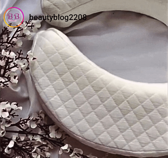 Glow trifft Komfort Kissen on a soft background with delicate flowers, showcasing comfort and design.